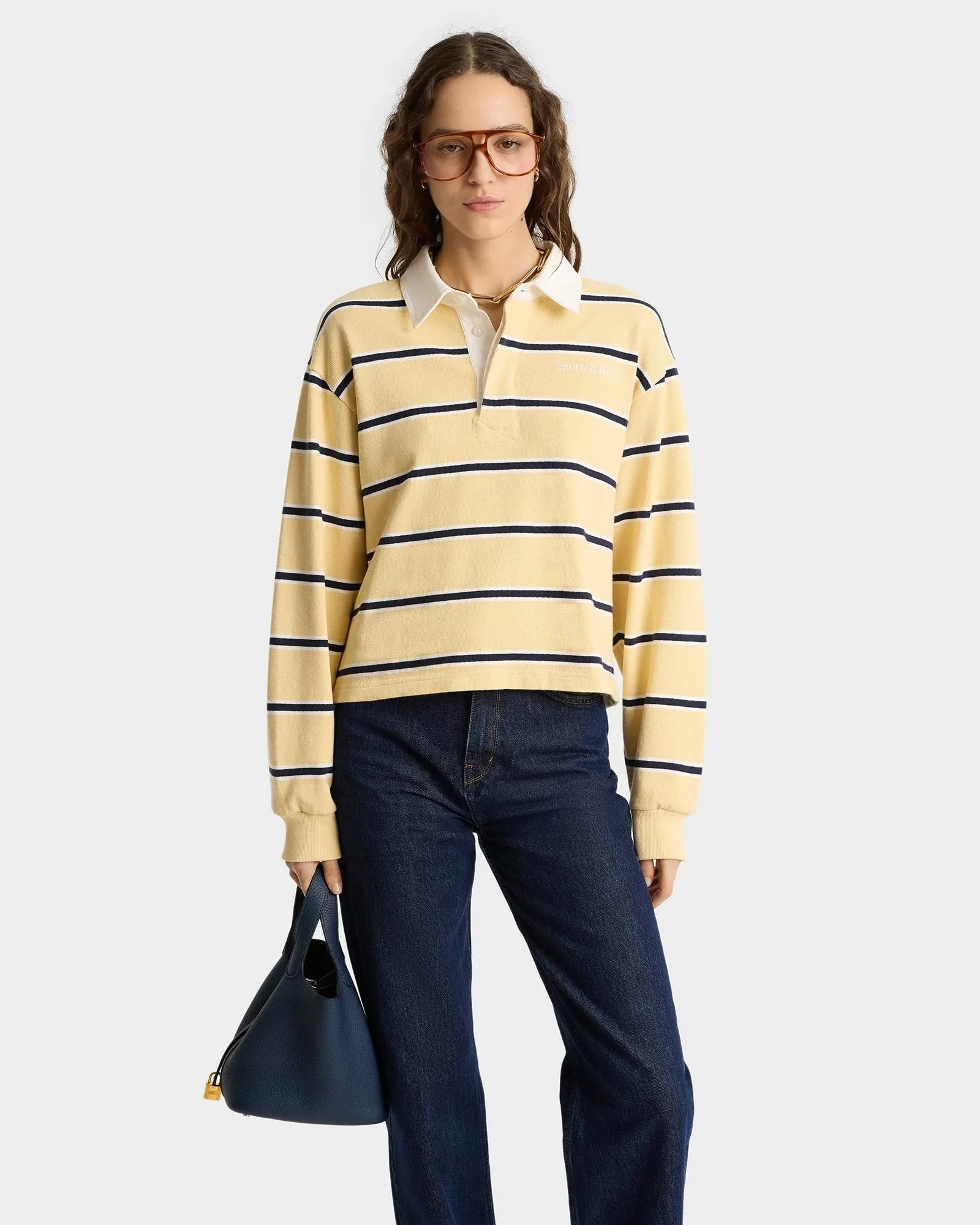 Sporty & Rich Serif Logo Cropped Rugby Polo in Almond/Dark Navy/White